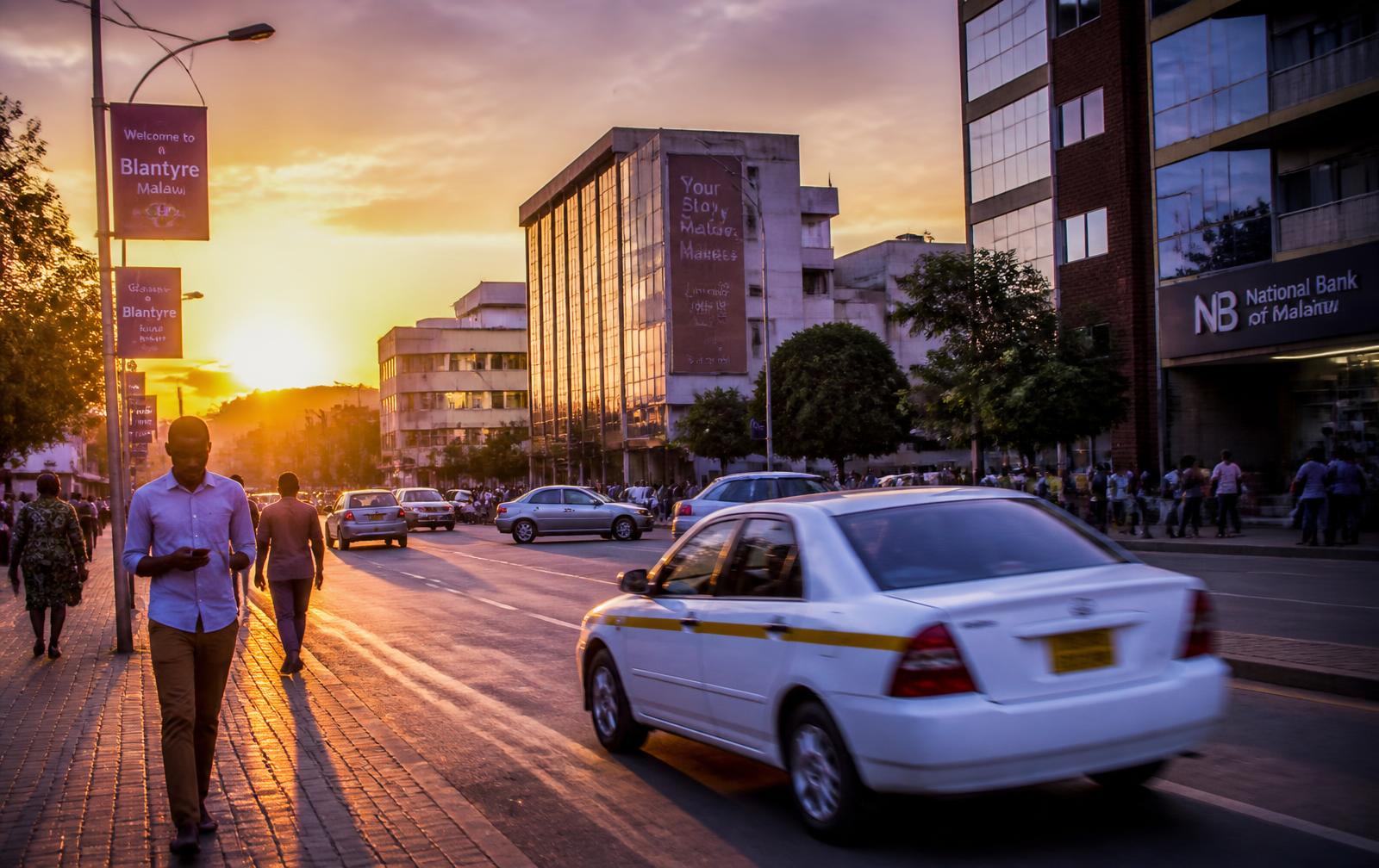 A Malawian city skyline representing Zane's connected digital ecosystem